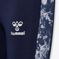 Sidevisning af Hummel NANNA leggings med blomsterprint på sidepanelerne.